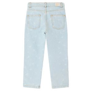 Back view of Bonpoint Girls' Eloha Wide-Leg Denim Trousers in light blue cherry jacquard, featuring a high waist, two rear pockets, belt loops, visible stitching, and a subtle all-over pattern.