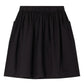 The Bonpoint Girls' Lierre Hand-Embroidered Skirt is a black knee-length skirt with an elastic waistband, two side pockets, and hand-embroidered hearts, shown on a plain white background.