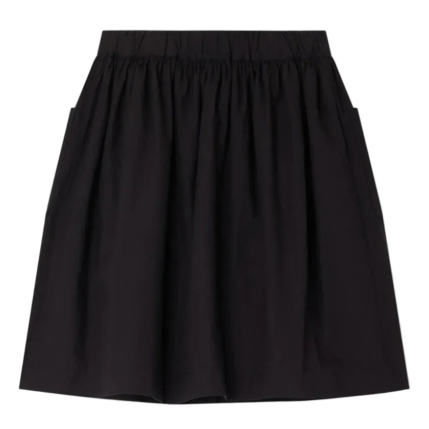 The Bonpoint Girls' Lierre Hand-Embroidered Skirt is a black knee-length skirt with an elastic waistband, two side pockets, and hand-embroidered hearts, shown on a plain white background.