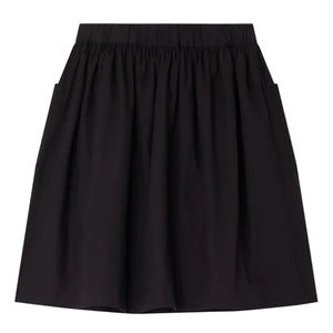 The Bonpoint Girls' Lierre Hand-Embroidered Skirt is a black knee-length skirt with an elastic waistband, two side pockets, and hand-embroidered hearts, shown on a plain white background.