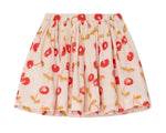 The Bonpoint Girls' Suzon Skirt features a cream hue with a cheerful cherry and yellow leaf print, crafted from soft organic cotton. It has a gathered elastic waistband and flared silhouette for playful comfort.
