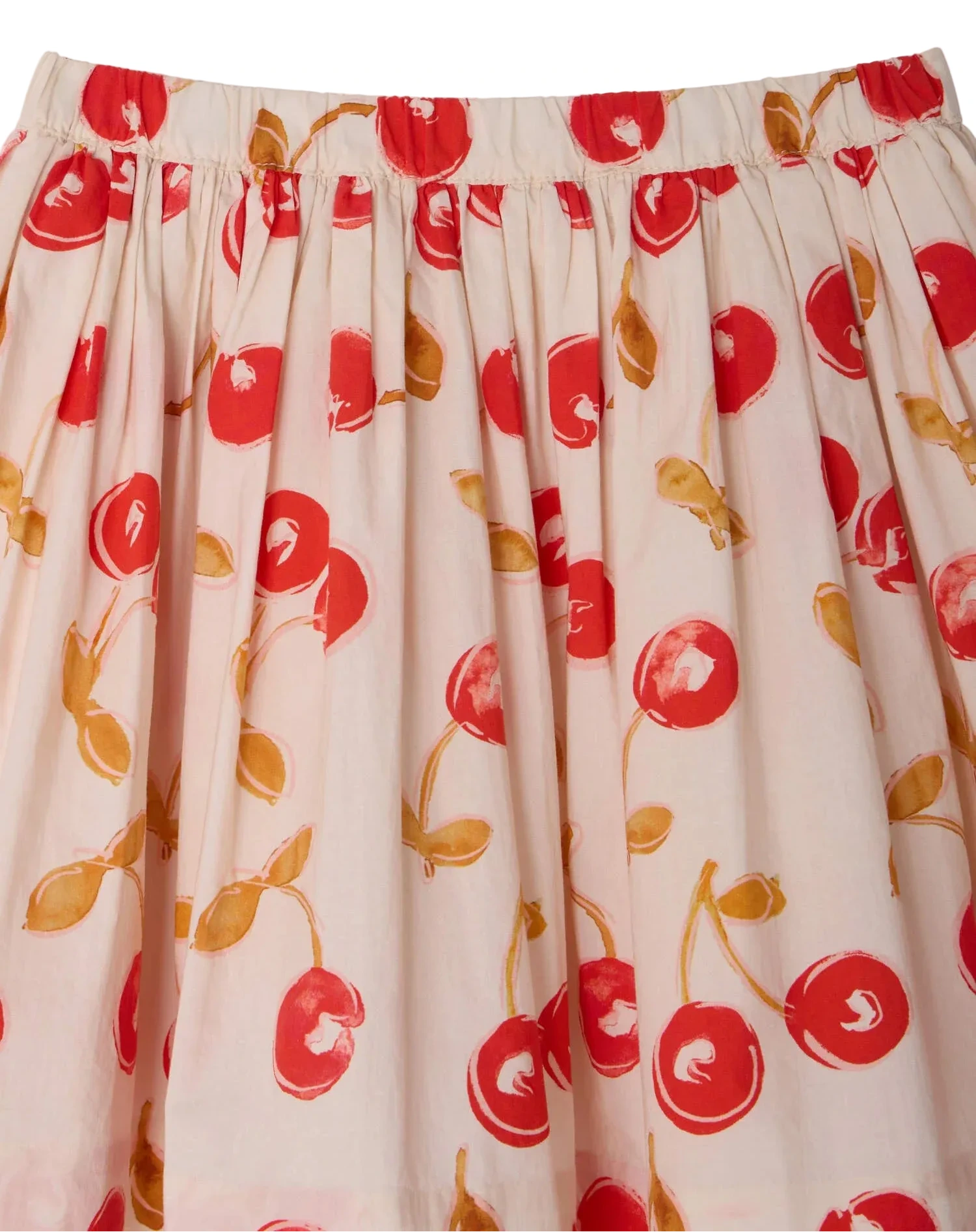 The Girls' Suzon Skirt by Bonpoint is a light-colored organic cotton skirt with a gathered waist and a red cherry print with green leaves.