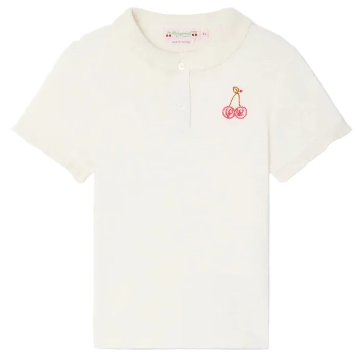 The Bonpoint Girls' Gina T-Shirt features short sleeves, a ruffled Peter Pan collar, and a small embroidered cherry on the left chest.