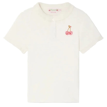 The Bonpoint Girls' Gina T-Shirt features short sleeves, a ruffled Peter Pan collar, and a small embroidered cherry on the left chest.