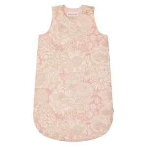 The Baby Joujou Sleeping Bag in Liberty Fabric by Bonpoint is a sleeveless organic cotton sleep sack with a pink and cream floral pattern, rounded bottom, and easy side zipper for quick nighttime changes.