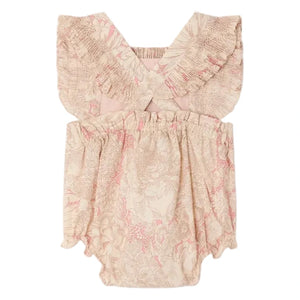 Bonpoint's Baby Girls' Lakiss Romper features smocked, hand-embroidered Liberty fabric with ruffled straps, elastic waist and leg openings, and a beige and pink floral print in soft organic cotton.
