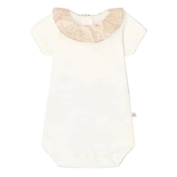 The Bonpoint Baby Girls' June Bodysuit with Liberty Fabric features short sleeves and a beige ruffled Liberty collar, displayed flat against a plain background.