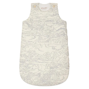 The Bonpoint Baby Joujou Sleeping Bag in Liberty Fabric is a sleeveless organic cotton sleep sack with a white background, blue landscape print of trees, mountains, and boats, plus a side zipper for easy nighttime changes.