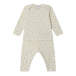 The Bonpoint Baby Timi Set features a cream, long-sleeve top and matching pants made from organic cotton, both adorned with a subtle sailboat print.