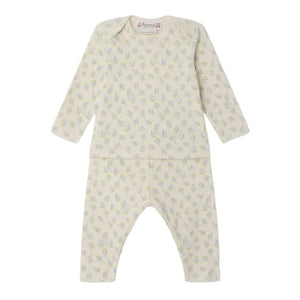 The Bonpoint Baby Timi Set features a cream, long-sleeve top and matching pants made from organic cotton, both adorned with a subtle sailboat print.