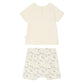 The Bonpoint Baby Boys' Fanilo Embroidered and Dog-Print Set features a short-sleeved cream organic cotton top with back snap buttons and matching shorts, both adorned with a simple black dog and kite print.