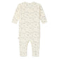 The Bonpoint Baby Boys' Georget Pajamas feature a cream-colored, long-sleeve onesie with simple black dog prints, crafted from soft organic cotton for your baby's comfort.