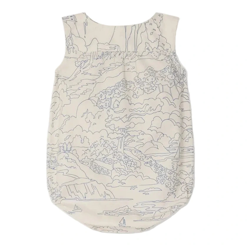 The Bonpoint Baby Boys' Nico Romper is a sleeveless organic cotton outfit in light beige, adorned with a blue landscape print of trees, hills, and boats.