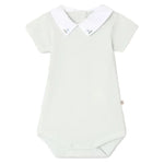 Bonpoint’s Baby Juillet Bodysuit features hand-embroidered sailboats, soft organic cotton, short sleeves, a white Peter Pan collar, and two buttons at the back of the neck.