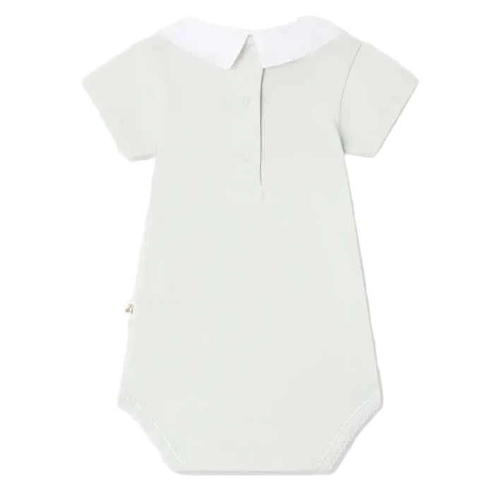 The Bonpoint Baby Juillet Bodysuit features hand-embroidered sailboats, light grey organic cotton, short sleeves, a white collar, buttoned front placket, and stitched edges, shown against a plain white background.