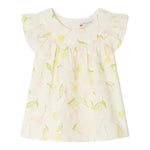 The Bonpoint Baby Girls' and Girls' Lala Blouse is a light-colored cherry print top with short flutter sleeves, featuring yellow and pink cherries with green leaves, crafted from organic cotton and finished with mother-of-pearl buttons.