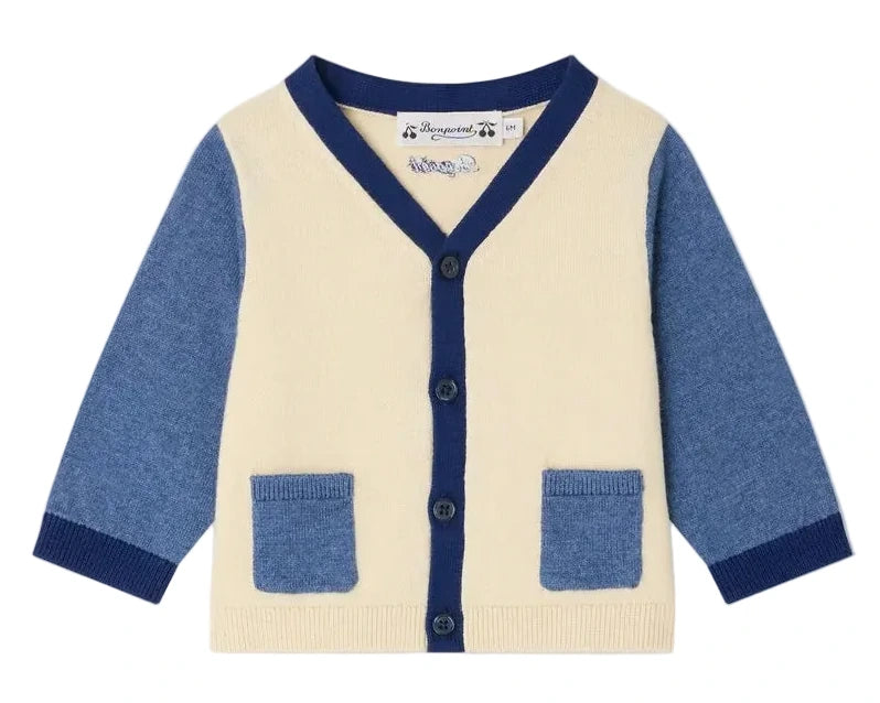 The Bonpoint Baby Boys' Tahiel V-neck Cardigan features a cream front and back, blue sleeves, trim, pockets, and dark buttons. Made from soft organic cotton for comfort and style.