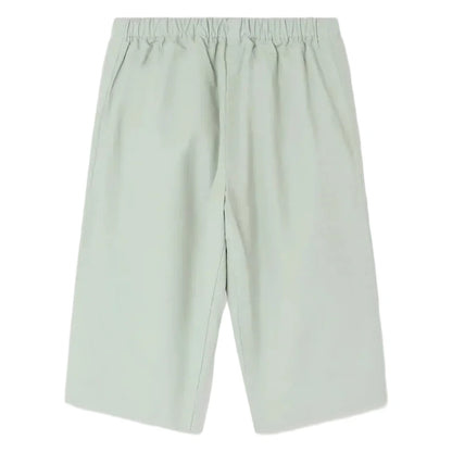 Light green knee-length Baby Boys' Dandy Trousers by Bonpoint, featuring an elastic waistband and side pockets. Shown flat on a white background, these shorts offer comfort and style for your baby.