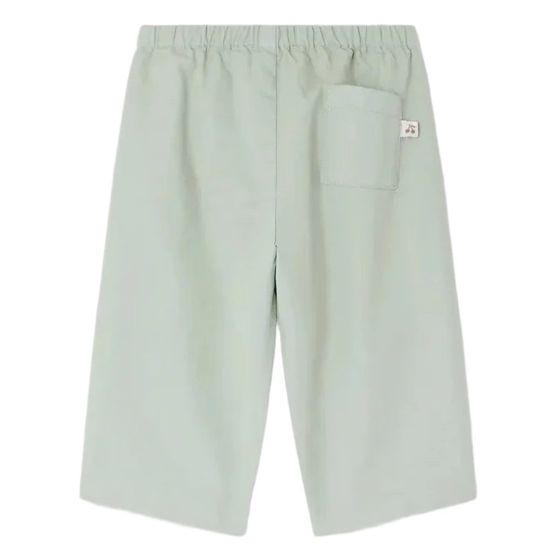 Bonpoint Baby Boys' Dandy Trousers in light green, with an elastic waistband and a single back right patch pocket, shown against a white background.