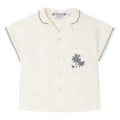The Bonpoint Baby Boys' and Boys' Lennard Shirt is a short-sleeved cream shirt in organic cotton, with dark stitching on the collar and sleeves, button front, and a chest pocket embroidered with palm trees.