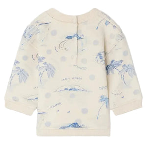 The Bonpoint Baby Boys' and Boys' Dady Sweatshirt features a blue island print with palm trees and ocean illustrations, light blue polka dots, and a back button closure. Made from soft organic cotton fleece for ultimate comfort.