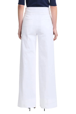Person shown from the back against a plain background wearing the Altuzarra Rudy Pant, which features a high-waisted, wide-leg silhouette, paired with a dark top.