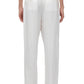 Person wearing loose-fitting 3.1 Phillip Lim Double Pleated Tapered Trouser, made of soft white poplin, viewed from the back, showcasing the waist and leg details with a touch of elegance. Paired with dark shoes, these trousers create a refined yet relaxed look.