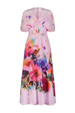 The Lela Rose Watercolor Floral Cotton Voile Isabel Dress, crafted in cotton voile, is a pink midi dress featuring a vibrant watercolor floral print, short sleeves, a gathered waist, and a V-neckline.