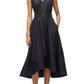 A woman wears the Crisscross Back Midi Dress by 3.1 Phillip Lim—a sleeveless, V-neck style with a black belted A-line skirt in technical poplin, asymmetrical hem, and paired with black sandals.