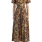 A person wears the Adam Lippes Leighton Dress—a short-sleeved, collared, ankle-length Italian cotton poplin style in a brown and black abstract animal print—paired with black shoes.