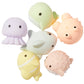 Sunnylife Sea Animal Splash Toys featuring six pastel-colored sea creatures, including a jellyfish, whale, dolphin, fish, and pufferfish.