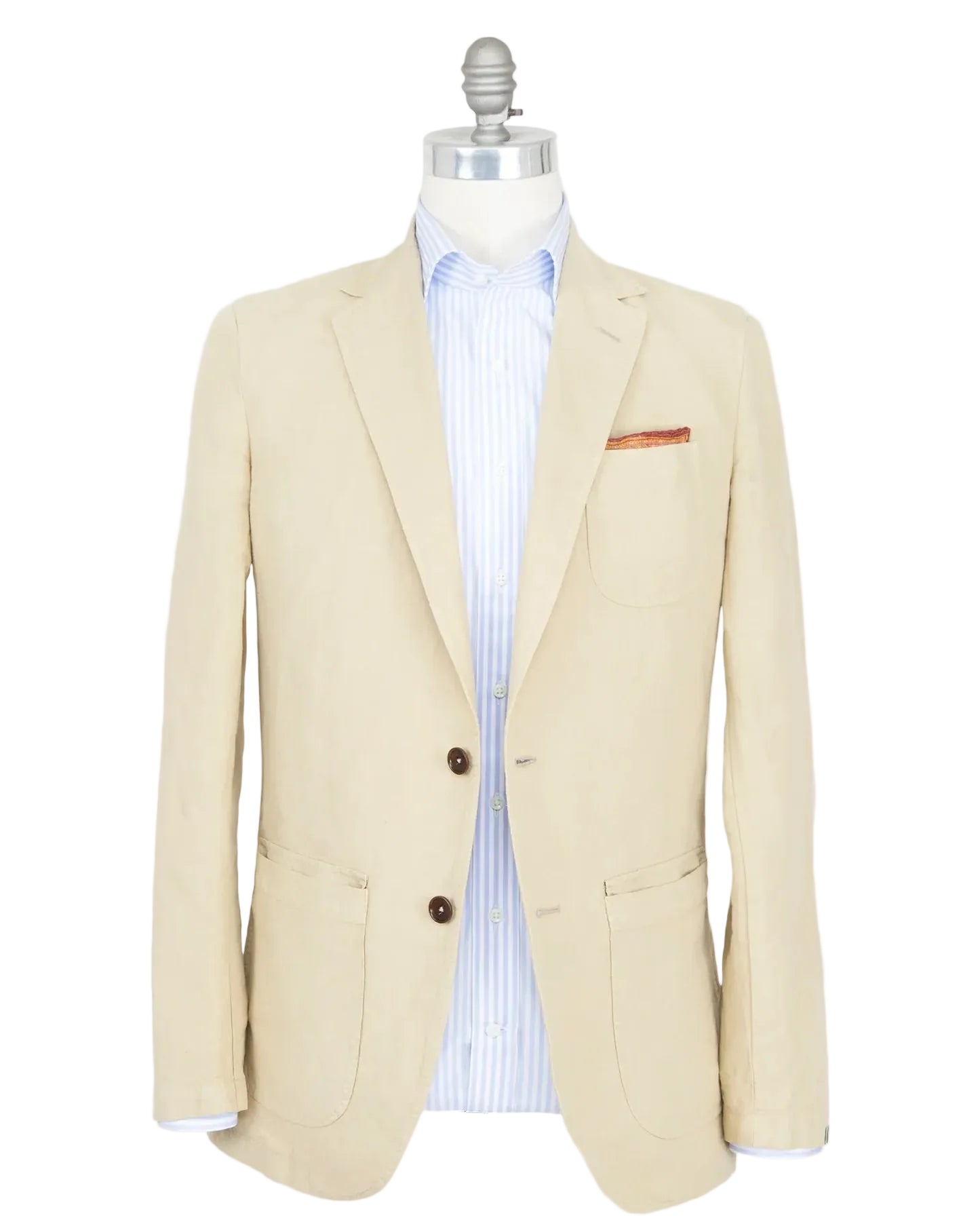 Sid Mashburn's Butcher Jacket, crafted from a refined cotton and canapa blend in beige, features two dark buttons and three front pockets inspired by a classic chore coat, and is shown paired with a light blue striped dress shirt on a mannequin.