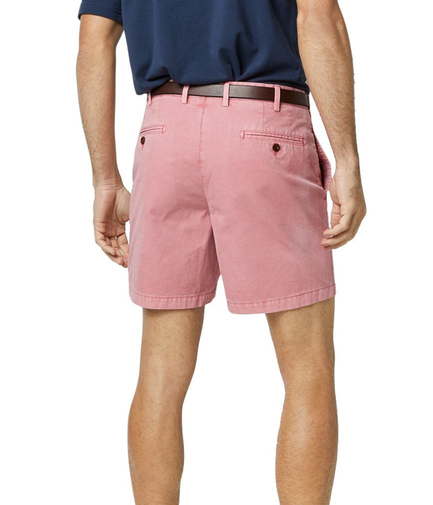 Man wearing Sid Mashburn Garment Dyed Sport Short, 7" inseam lightweight cotton twill shorts and a dark blue shirt with a visible belt from the back view.