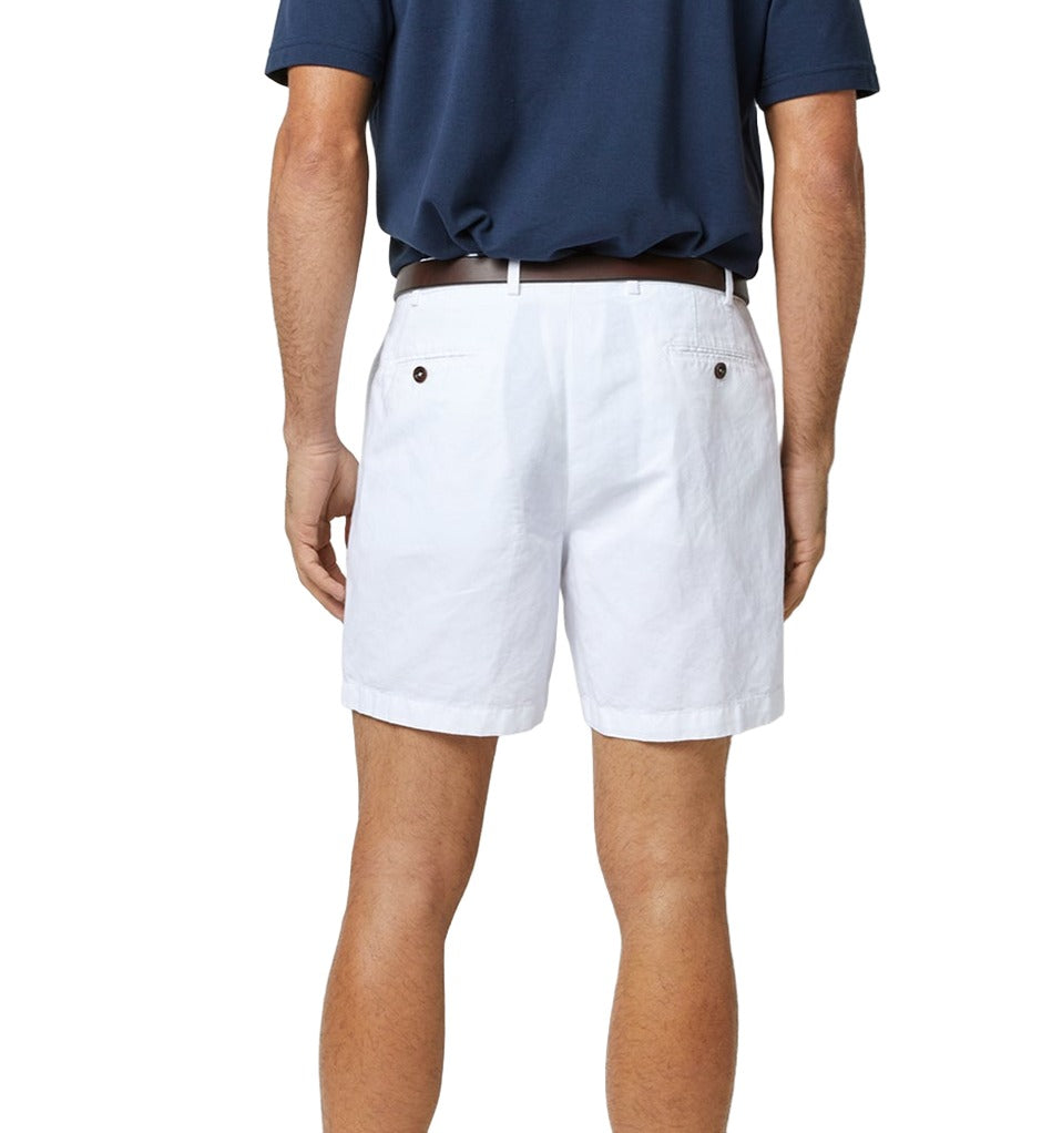 Back view of a person wearing a dark blue garment-dyed shirt, Sid Mashburn Garment Dyed Sport Short by Sid Mashburn, and a brown belt.