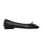 Side view of Ann Mashburn's Square Toe Ballet Flat in black lambskin, featuring a small bow on the toe, low heel, and cushioned insole for added comfort.