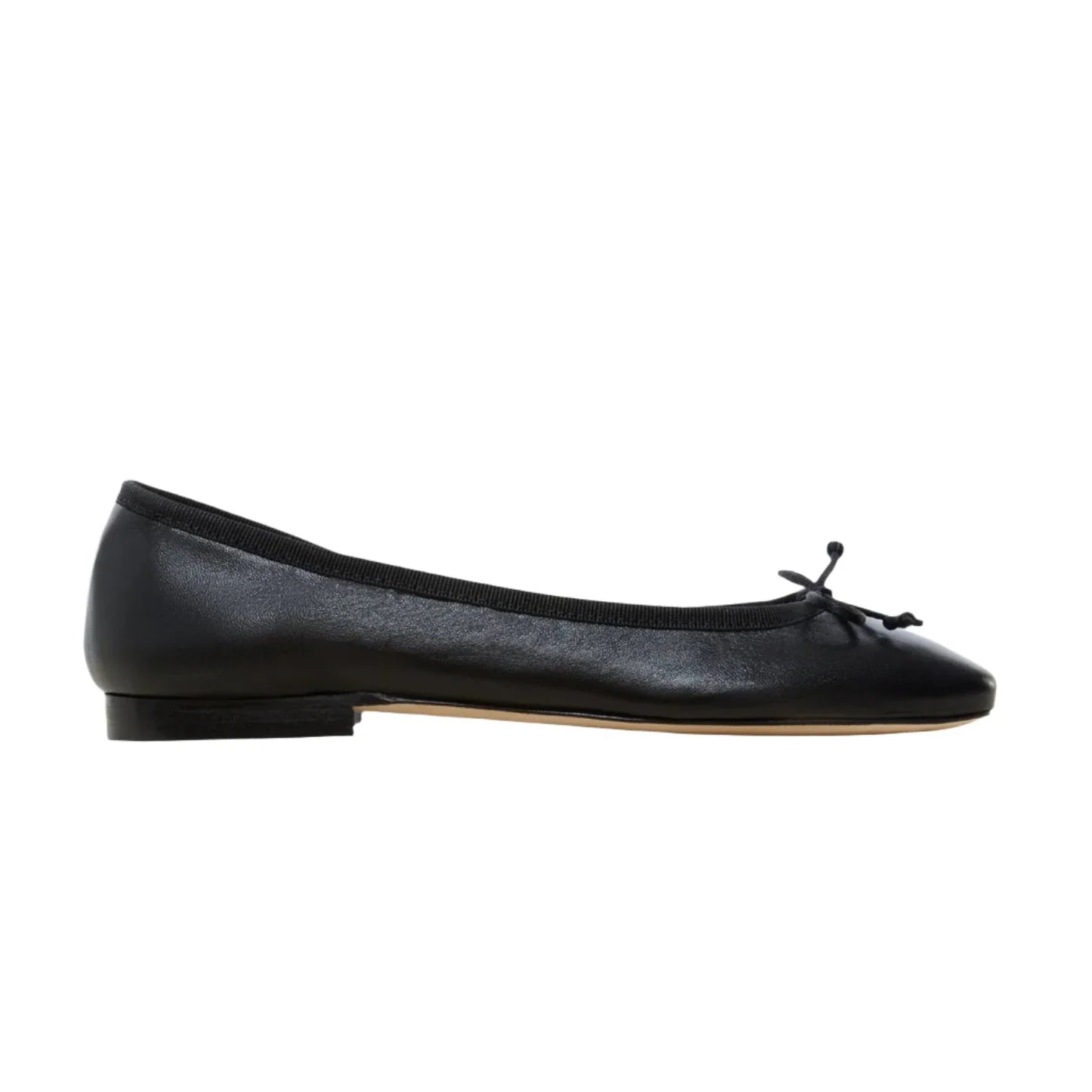 The Ann Mashburn Square Toe Ballet Flat by Ann Mashburn is a luxurious black shoe made from Italian lambskin, featuring a small bow on the front, a low heel, and a square toe.