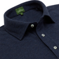 A close-up of a navy blue Sid Mashburn Long-Sleeve Polo shows a cut-and-sew collar, white buttons, and a green inner label with "SID MASHBURN.