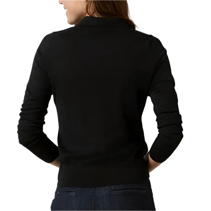 A person with long hair is shown from the back, wearing an Ann Mashburn Alida Johnny-Collar Sweater and dark jeans.