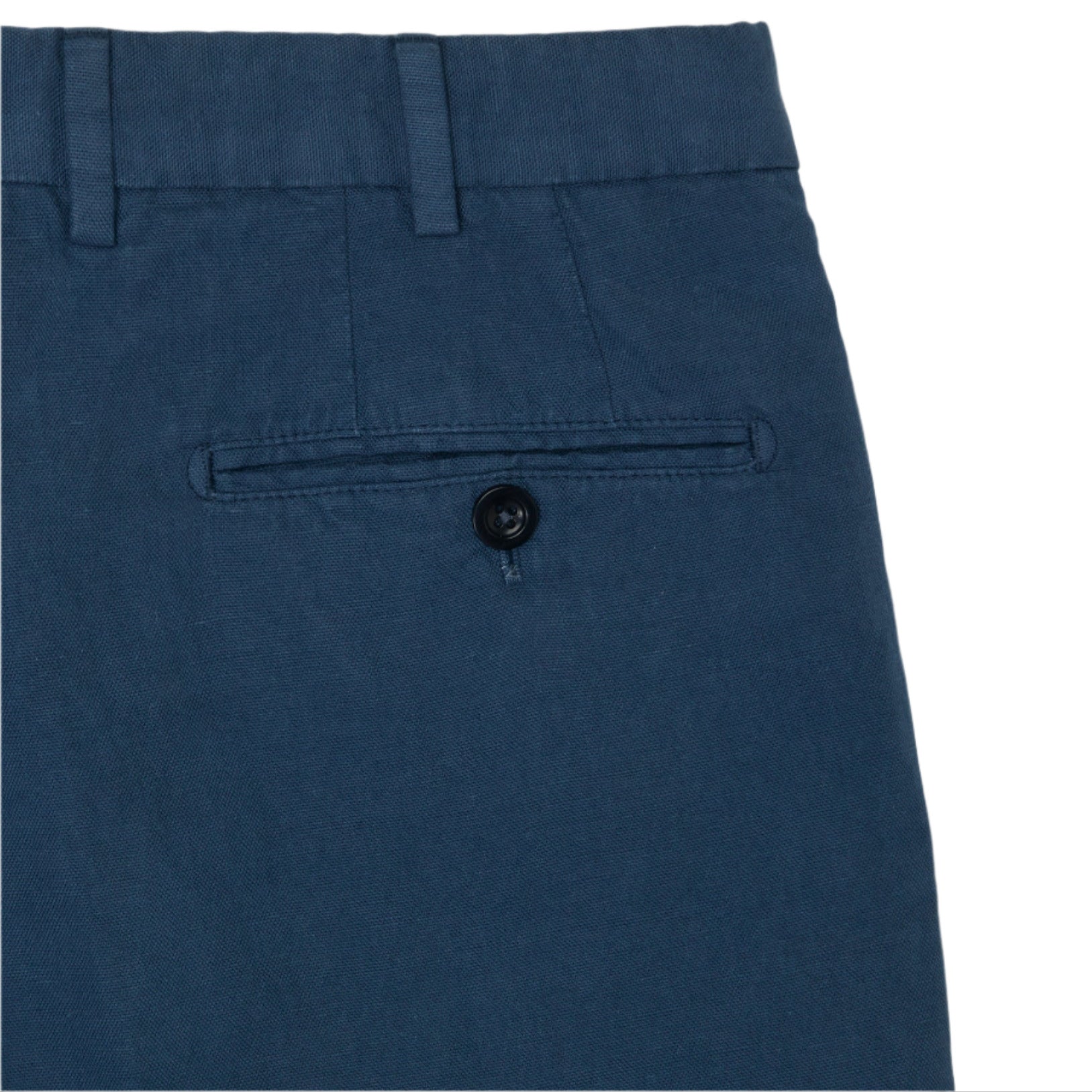 Close-up of the back pocket area of Sid Mashburn Sport Trouser in blue, featuring a single black button and belt loops, crafted from a cotton and canapa blend for a tailored look.