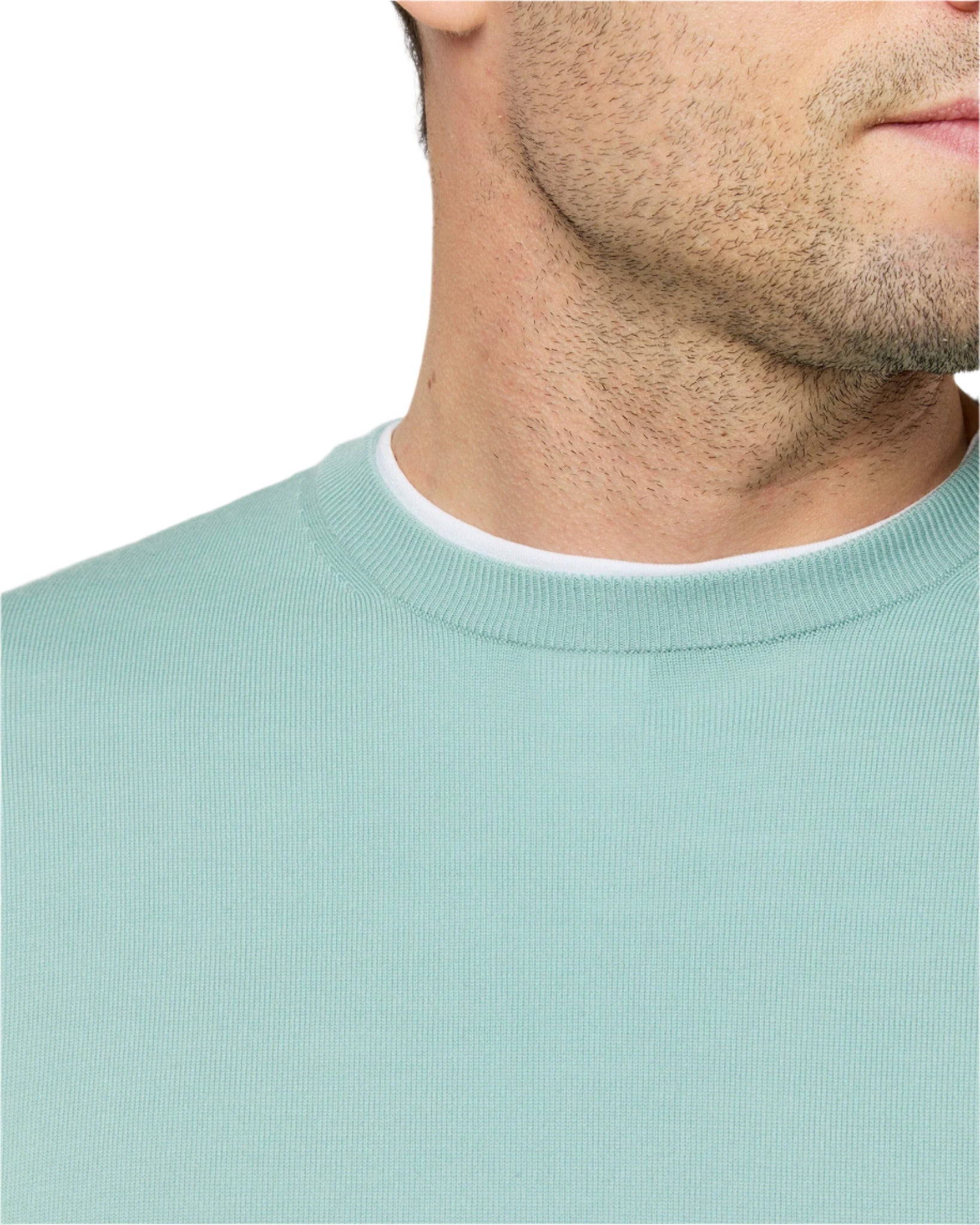 A close-up of a man's lower face and neck shows him wearing the Sid Mashburn Fine-Gauge Crewneck Sweater in light green over a white shirt, set against a white background.