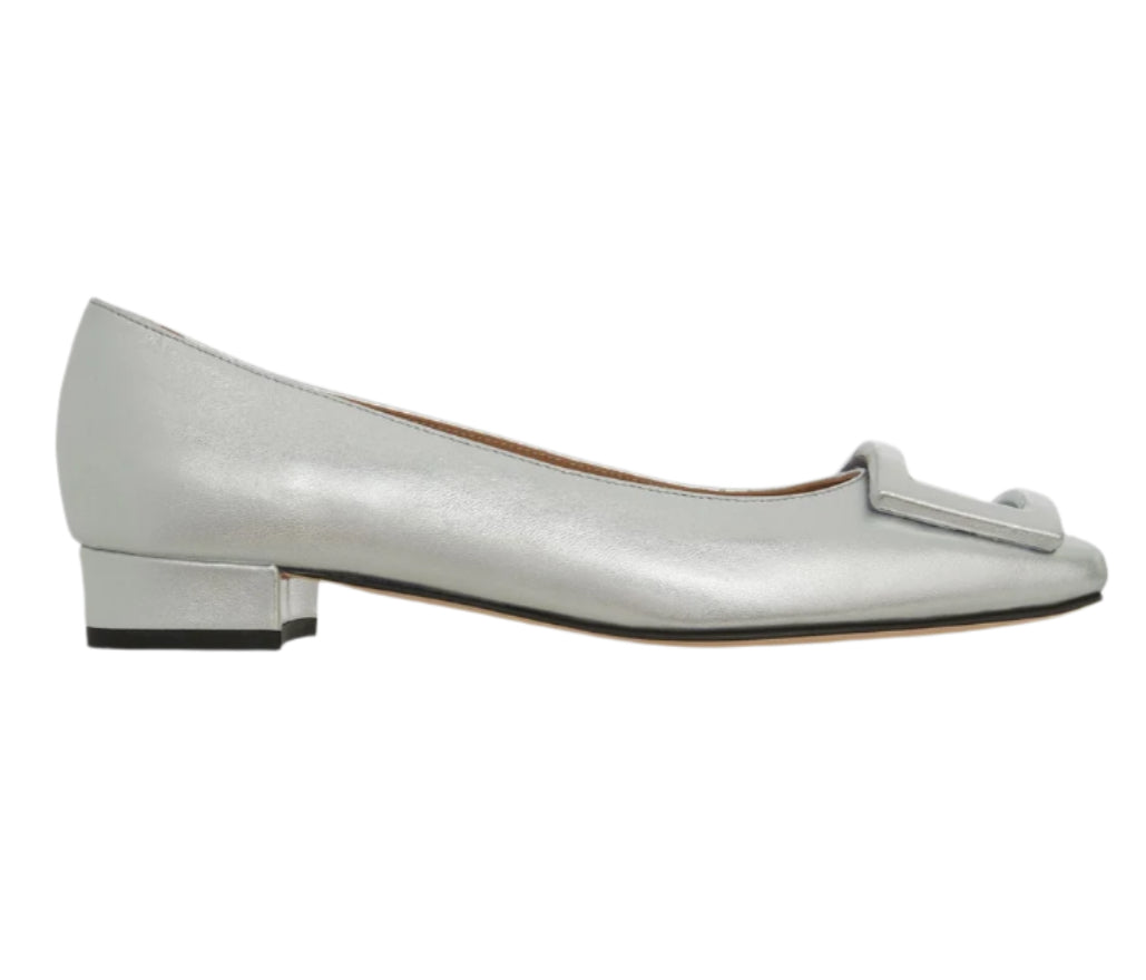The Ann Mashburn Buckle Shoe for women is crafted in metallic silver goat leather with a demi heel, square toe, and a decorative rectangular front detail.