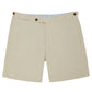 Sid Mashburn Sport Shorts Side Tab in beige seersucker, featuring side pockets, brown waistband buttons, and elasticized tabs for comfort. Shown against a white background.