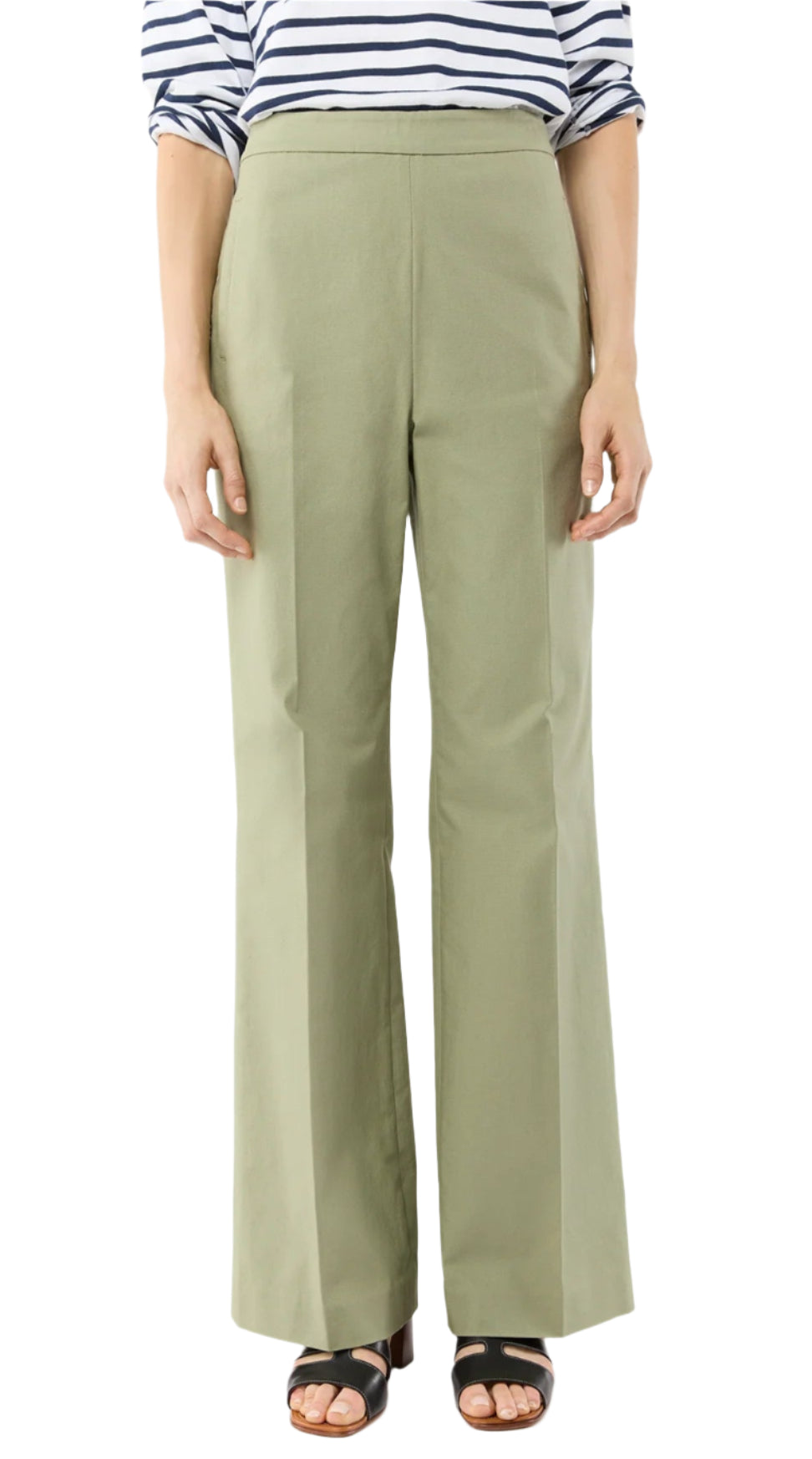 A person shown from mid-torso to feet wears a striped long-sleeve shirt, Ann Mashburn Hutton Stretch Canvas Pant with a flattering waist, and black sandals.