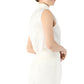 A person wearing the Ann Mashburn Clair Top—a sleeveless, white crisp poplin blouse—paired with white high-waisted pants, shown in profile against a white background.