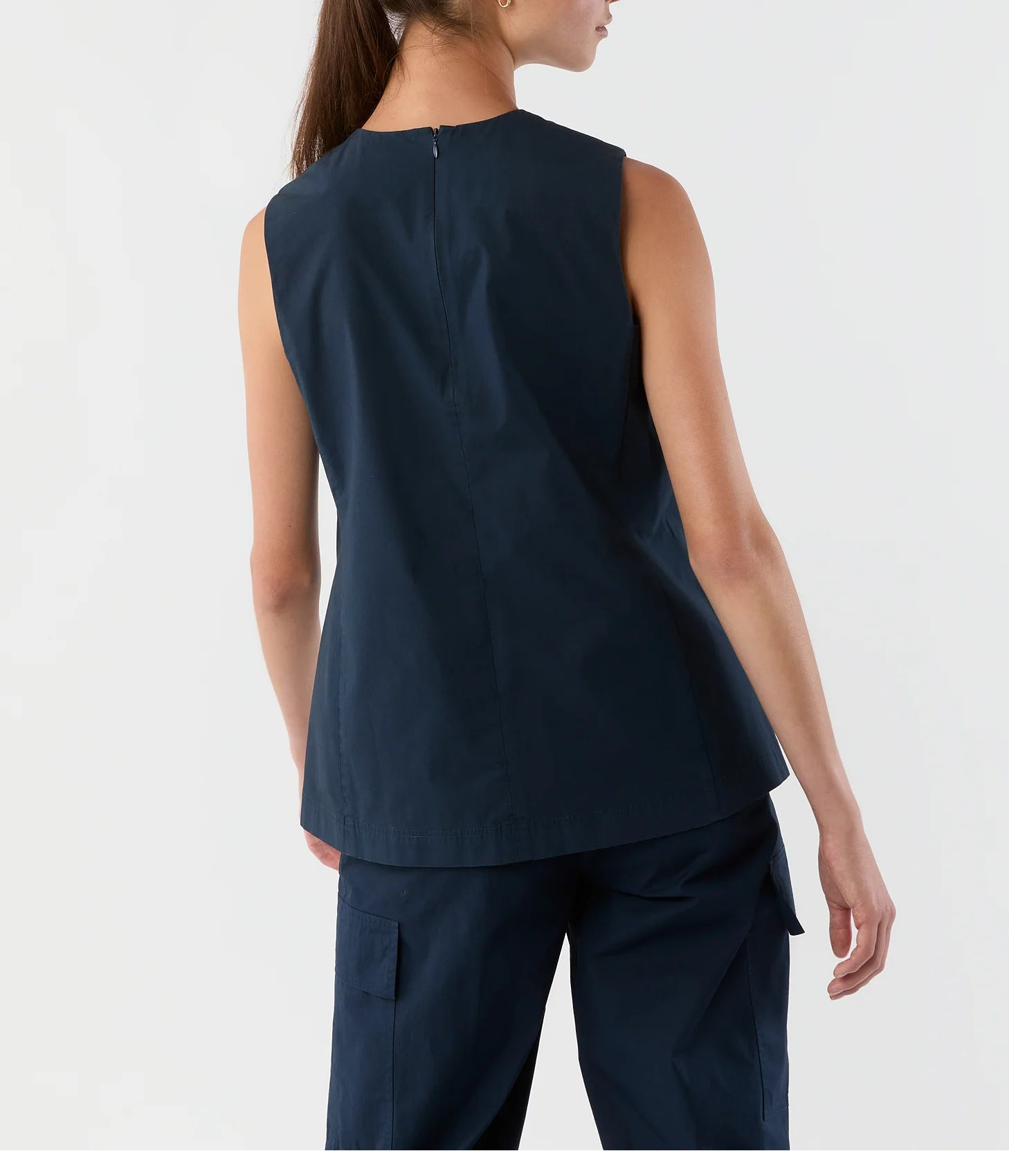 A person is shown from the back against a plain background wearing the Ann Mashburn Jo Bi-Stretch Tropical Wool Tunic with matching pants.