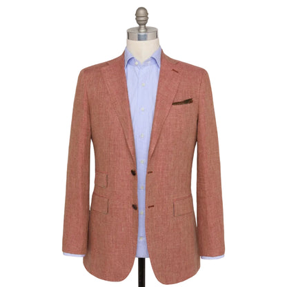 The Sid Mashburn Kincaid No. 3 Jacket in salmon, featuring full canvas construction, is styled over a light blue dress shirt and displayed on a mannequin against a white background.