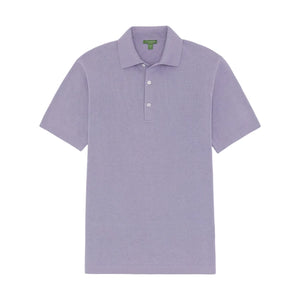 The Sid Mashburn Short-Sleeved Rally Polo Sweater is a light purple slim fit polo featuring a collar, three white buttons on the placket, short sleeves, and a green label inside the neck.