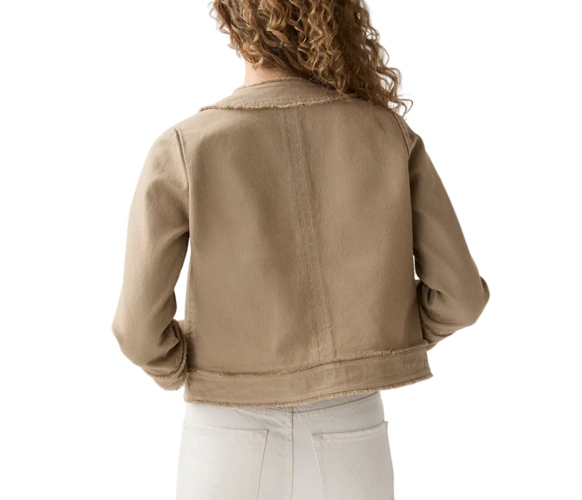A person with curly hair, seen from behind, wears the Ann Mashburn Kiki Stretch Canvas Jacket and white pants against a plain white background.