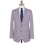 The Sid Mashburn Kincaid No. 2 Jacket in light purple herringbone is displayed on a mannequin, styled with a white dress shirt, navy patterned tie, and a white pocket square.