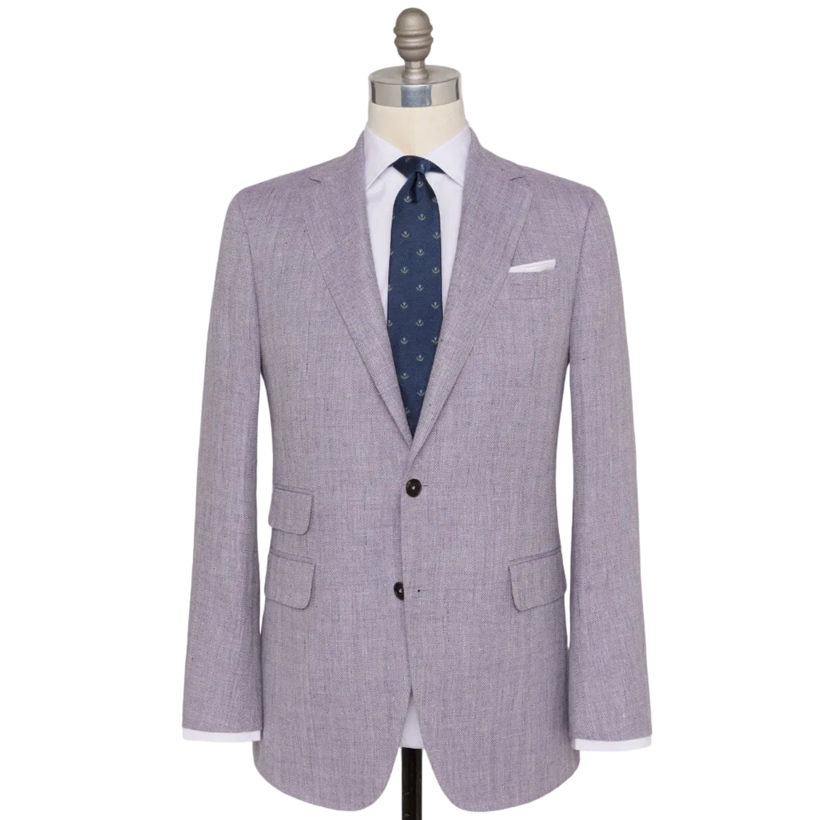 The Sid Mashburn Kincaid No. 2 Jacket in light purple herringbone is displayed on a mannequin, styled with a white dress shirt, navy patterned tie, and a white pocket square.